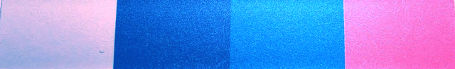 blue pearl on swatch of white, black, blue, and red