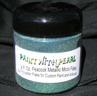 Peacock metallic flake is a perfect mixture of blue and gold flakes for custom paint.